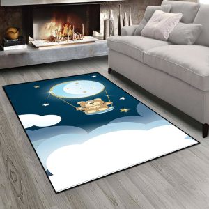 فرش چاپی اتاق نوزاد طرح عروسکی خرسی در حال تاب سواری با ماه